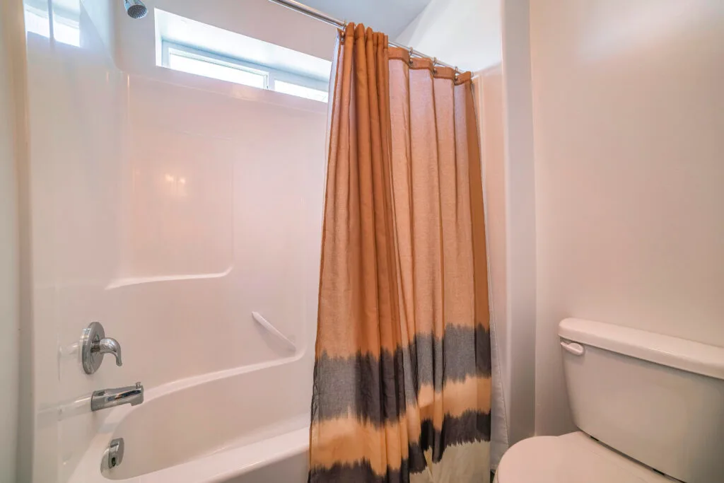 How to Clean a Shower Curtain and Liner to Fight Mold